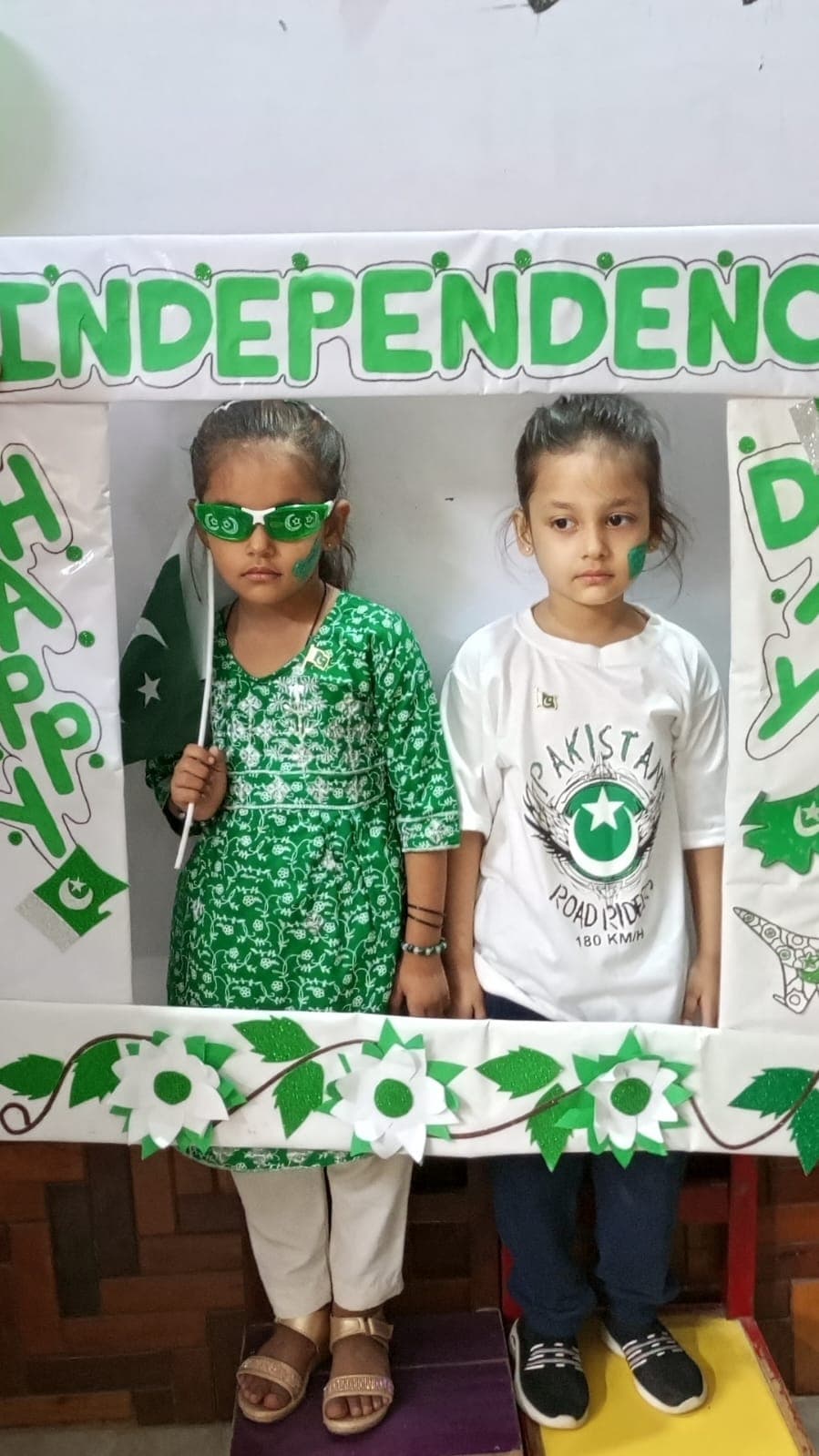 Students enjoying the Independence Day photo frame