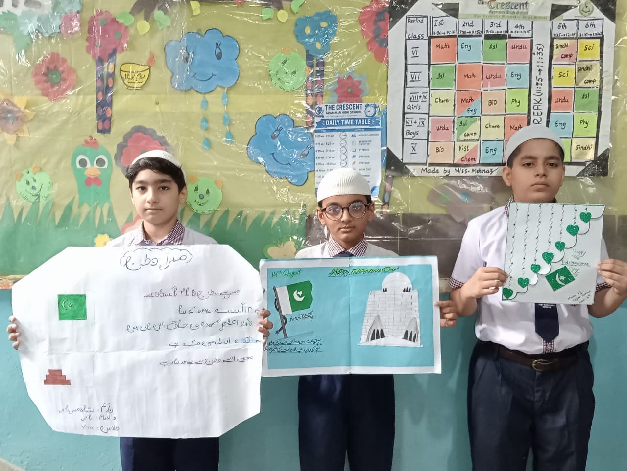 The Crescent Grammar High School students with their handmade Independence Day artwork