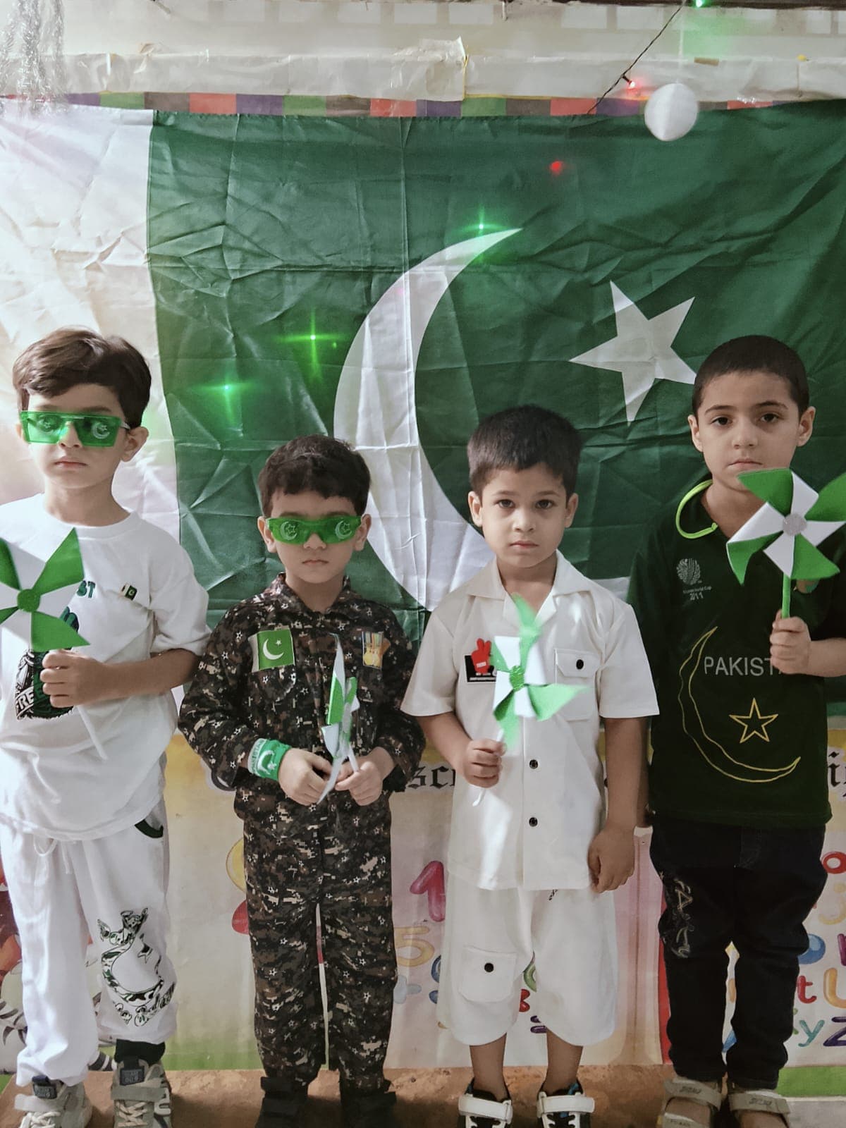 Students celebrating Independence Day with flags