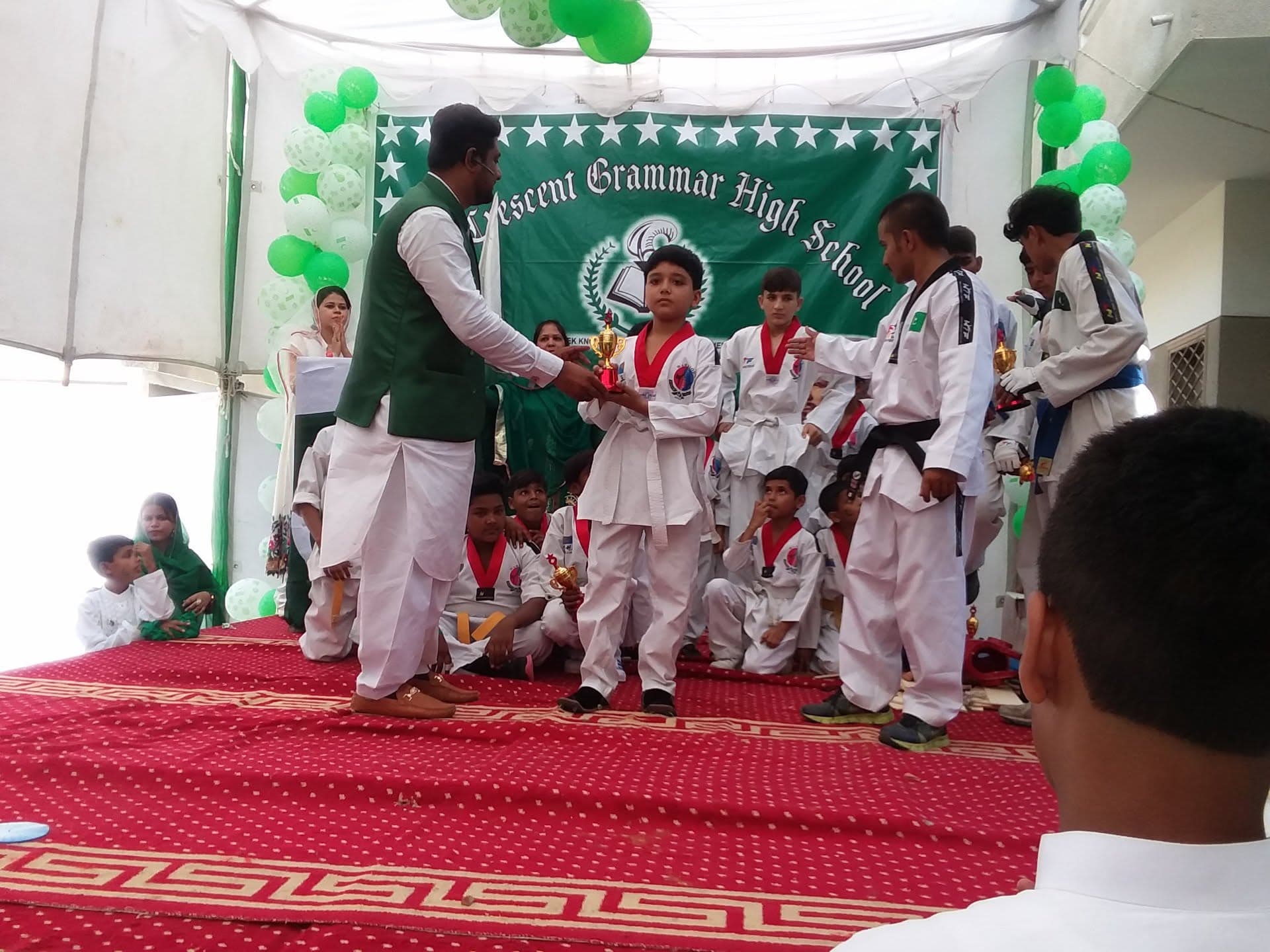 Taekwondo trophy presentation